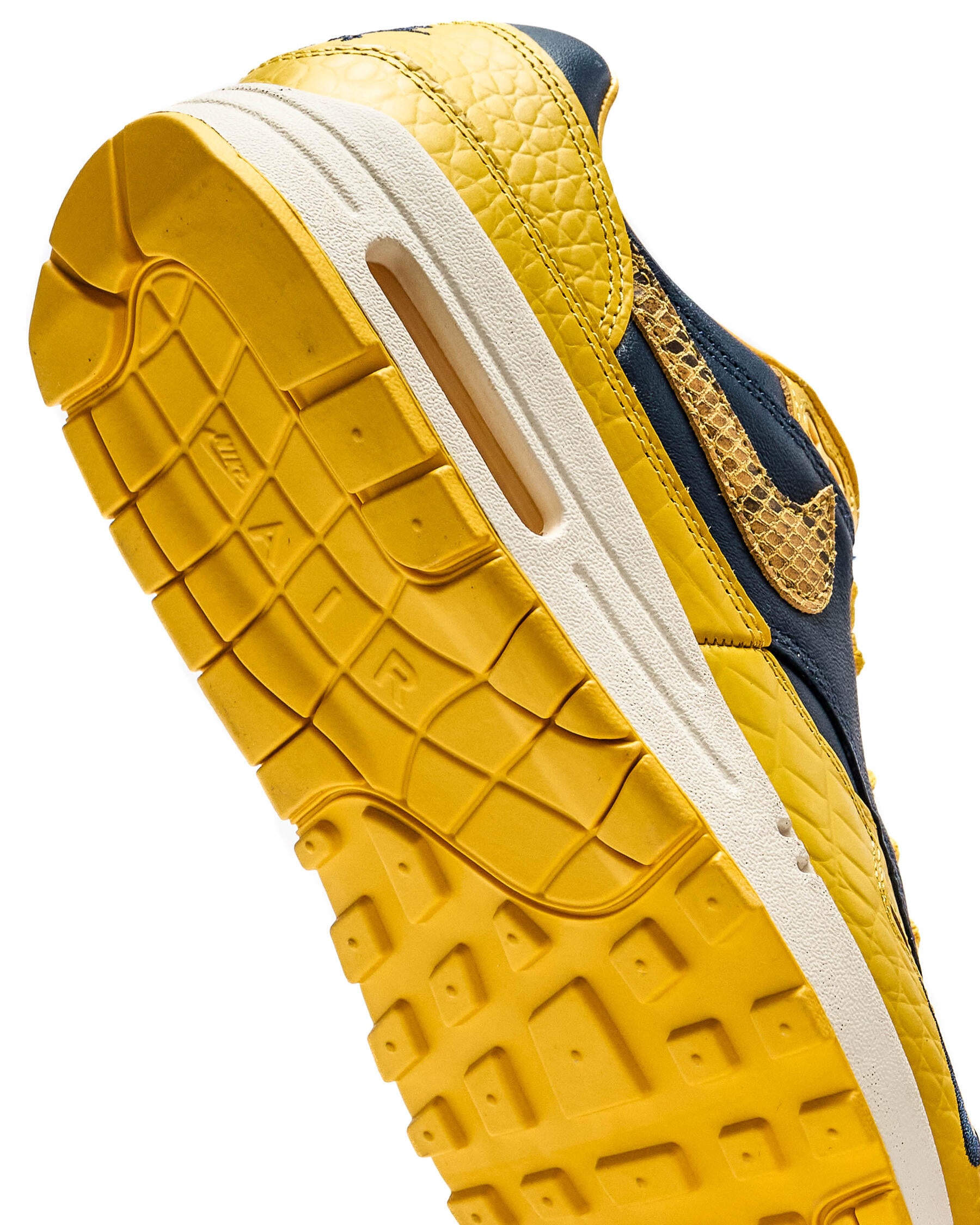 De Nike Air max 1 CO.JP Michigan Head to Head - zool aanzicht